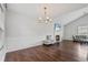 Bright living room with fireplace, hardwood floors, vaulted ceilings and modern lighting at 335 Lee Miller Ct, Suwanee, GA 30024