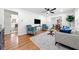 Open-concept living room showcasing hardwood floors and stylish decor at 801 N Evelyn Nw, Atlanta, GA 30318
