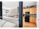 Stylish kitchen featuring granite countertops, stainless steel appliances, and a brick backsplash at 1605 Ridenour Pkwy, Kennesaw, GA 30152