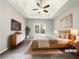 Relaxing primary bedroom suite with a tray ceiling. (Virtually Staged) at 200 Pine Trl, Dallas, GA 30157