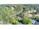 Aerial shot showcasing lush landscaping, golf course, and clubhouse at 2001 Towne Lake W Hls, Woodstock, GA 30189