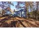 The backyard has a deck area, offering space for outdoor gatherings and relaxation at 2001 Towne Lake W Hls, Woodstock, GA 30189