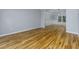 Open dining area with hardwood floors and coffered ceilings at 2001 Towne Lake W Hls, Woodstock, GA 30189