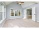 Bright, spacious main bedroom with carpet, tray ceiling, and ensuite access at 2001 Towne Lake W Hls, Woodstock, GA 30189