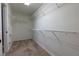 Spacious walk-in closet with wire shelving for optimal storage at 2001 Towne Lake W Hls, Woodstock, GA 30189