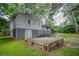 Home exterior view with patio, back yard, and greenery at 2475 Harvel Nw Dr, Atlanta, GA 30318