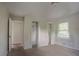This bedroom features carpeted floors and a closet at 2475 Harvel Nw Dr, Atlanta, GA 30318