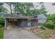 Charming single-Gathering home with a carport, showcasing its inviting curb appeal at 2475 Harvel Nw Dr, Atlanta, GA 30318