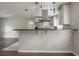 An open kitchen area with a view to the living room and hardwood floors at 2475 Harvel Nw Dr, Atlanta, GA 30318