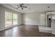 Bright living area with a view to the kitchen, hardwood floors, and large windows at 2475 Harvel Nw Dr, Atlanta, GA 30318