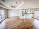 Open-concept living and dining area featuring hardwood floors and ample natural light at 2475 Harvel Nw Dr, Atlanta, GA 30318