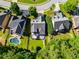 Aerial view of a home with a private backyard featuring a well-kept lawn and a pool at 81 Richmond Way, Villa Rica, GA 30180