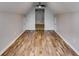 Finished attic area features sleek hardwood floors, and entry to another room at 81 Richmond Way, Villa Rica, GA 30180