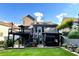 Expansive backyard featuring a spacious deck, covered patio, and lush green lawn perfect for outdoor entertaining at 81 Richmond Way, Villa Rica, GA 30180