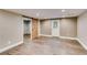 Finished basement with recessed lighting and a barn door at 81 Richmond Way, Villa Rica, GA 30180