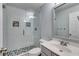 Bathroom with a glass-enclosed shower featuring white subway tiles and decorative accents at 81 Richmond Way, Villa Rica, GA 30180