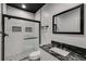 Modern bathroom featuring a white subway tile shower and granite vanity at 81 Richmond Way, Villa Rica, GA 30180
