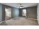 Bedroom featuring gray walls, carpet flooring, and a window with natural light at 81 Richmond Way, Villa Rica, GA 30180