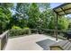 Spacious deck with grilling area and backyard views, perfect for outdoor entertaining and relaxation at 81 Richmond Way, Villa Rica, GA 30180