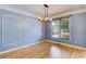 Spacious dining area with stylish light fixture and natural light at 81 Richmond Way, Villa Rica, GA 30180