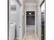 Hallway showing the laundry room, bedroom, and bathroom at 81 Richmond Way, Villa Rica, GA 30180