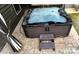 Inviting outdoor hot tub with clean water and tile surroundings at 81 Richmond Way, Villa Rica, GA 30180