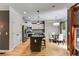 Modern kitchen with stainless steel appliances, granite countertops, and cozy dining area at 81 Richmond Way, Villa Rica, GA 30180