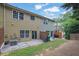 View of the back of the home featuring a small patio, air conditioning unit, and privacy fence at 1649 Southgate Mill Nw Dr, Duluth, GA 30096