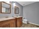 Bathroom with double sink vanity, modern fixtures, and neutral color palette at 1649 Southgate Mill Nw Dr, Duluth, GA 30096