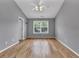 Spacious bedroom with hardwood floors and a large window for natural light at 1649 Southgate Mill Nw Dr, Duluth, GA 30096