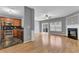 A combined kitchen and living room area with stainless steel appliances and hardwood floors at 1649 Southgate Mill Nw Dr, Duluth, GA 30096
