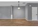 Spacious open-concept living room with hardwood floors at 1649 Southgate Mill Nw Dr, Duluth, GA 30096