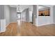 Spacious open-concept living room with hardwood floors and easy access to the kitchen at 1649 Southgate Mill Nw Dr, Duluth, GA 30096