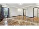 Bedroom featuring glossy marble floors, neutral paint color and natural light from the windows at 2711 Mcdonough Rd, Hampton, GA 30228