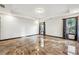 Bright bedroom with large windows, tray ceiling, and gleaming tile floors at 2711 Mcdonough Rd, Hampton, GA 30228