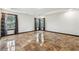 Bedroom featuring glossy marble floors, neutral paint color and natural light from the windows at 2711 Mcdonough Rd, Hampton, GA 30228