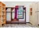 Spacious closet with custom shelving and racks for optimal organization at 2711 Mcdonough Rd, Hampton, GA 30228