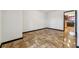 Large room featuring glossy marble floors, neutral paint color and an open doorway at 2711 Mcdonough Rd, Hampton, GA 30228