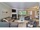 Relaxing living room with fireplace, comfortable seating and view to the outside at 4120 Buckley Woods Dr, Norcross, GA 30093