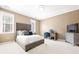 Bedroom featuring neutral carpet, a reading nook, and a dedicated desk space at 1121 Vinings Grove Se Way, Smyrna, GA 30082