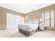 Bedroom features neutral carpet, and great natural light from two windows at 1121 Vinings Grove Se Way, Smyrna, GA 30082