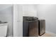 Laundry room with a utility sink, extra storage, and modern appliances at 1121 Vinings Grove Se Way, Smyrna, GA 30082