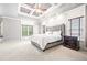 Large main bedroom with coffered ceiling, sitting area and neutral tones at 1121 Vinings Grove Se Way, Smyrna, GA 30082