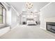 Spacious main bedroom with fireplace, coffered ceiling, and neutral tones at 1121 Vinings Grove Se Way, Smyrna, GA 30082