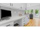Well-lit home office features custom cabinets, quartz countertop, and direct access to the backyard at 3803 Upland Dr, Marietta, GA 30066