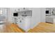 Bright office area with custom cabinetry, a built-in desk, and stylish finishes complements the open floor plan at 3803 Upland Dr, Marietta, GA 30066