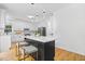 Modern kitchen featuring a central island with seating and pendant lighting at 3803 Upland Dr, Marietta, GA 30066