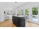 Kitchen featuring a central island, stainless appliances, and ample natural light at 3803 Upland Dr, Marietta, GA 30066