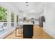 Open kitchen showcasing an island, stainless steel appliances, and hardwood floors at 3803 Upland Dr, Marietta, GA 30066