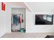 Bedroom closet with a clothing rack, a flat screen tv, and LED lighting at 5264 Prestley Crossing Ln, Douglasville, GA 30135